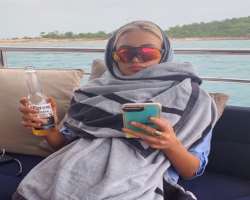 Gabrielle Epstein consuming alcohol